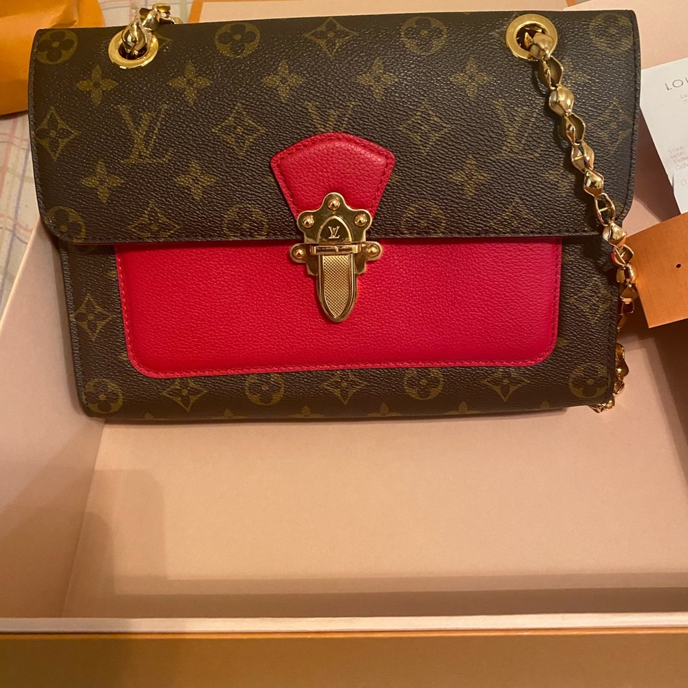 LV Hand bag , no wear or tear still got it’s receipt & box